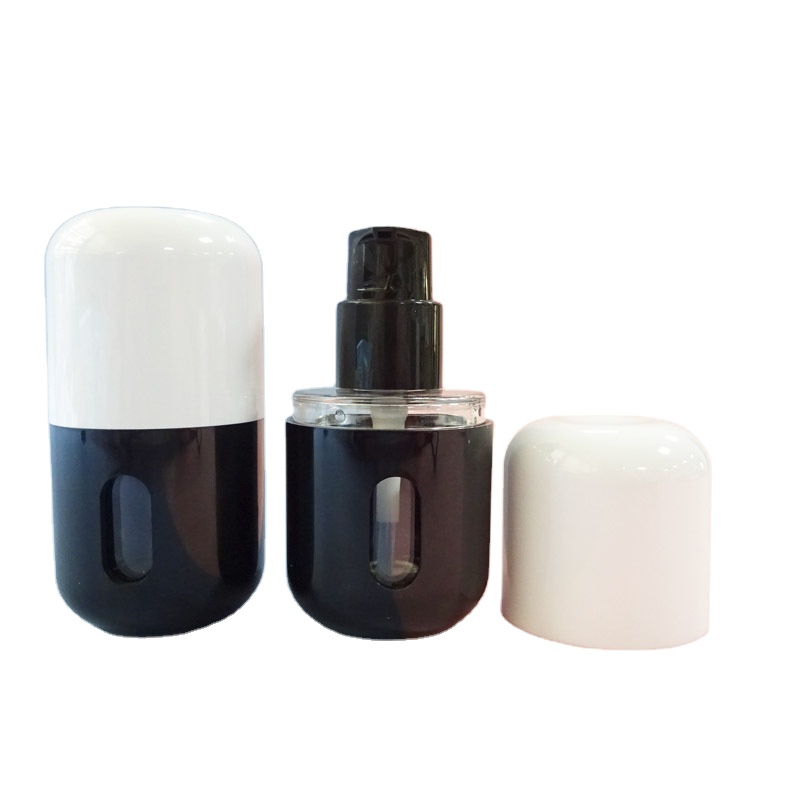 Manufacturer Custom 35ml Liquid Fakeup Cream Bottle Capsule Shape Black Clear Round Press Lock Pump Lotion Bottle - PB1704